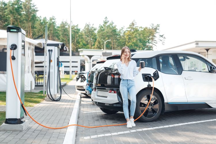Electric car charging at a petrol startion