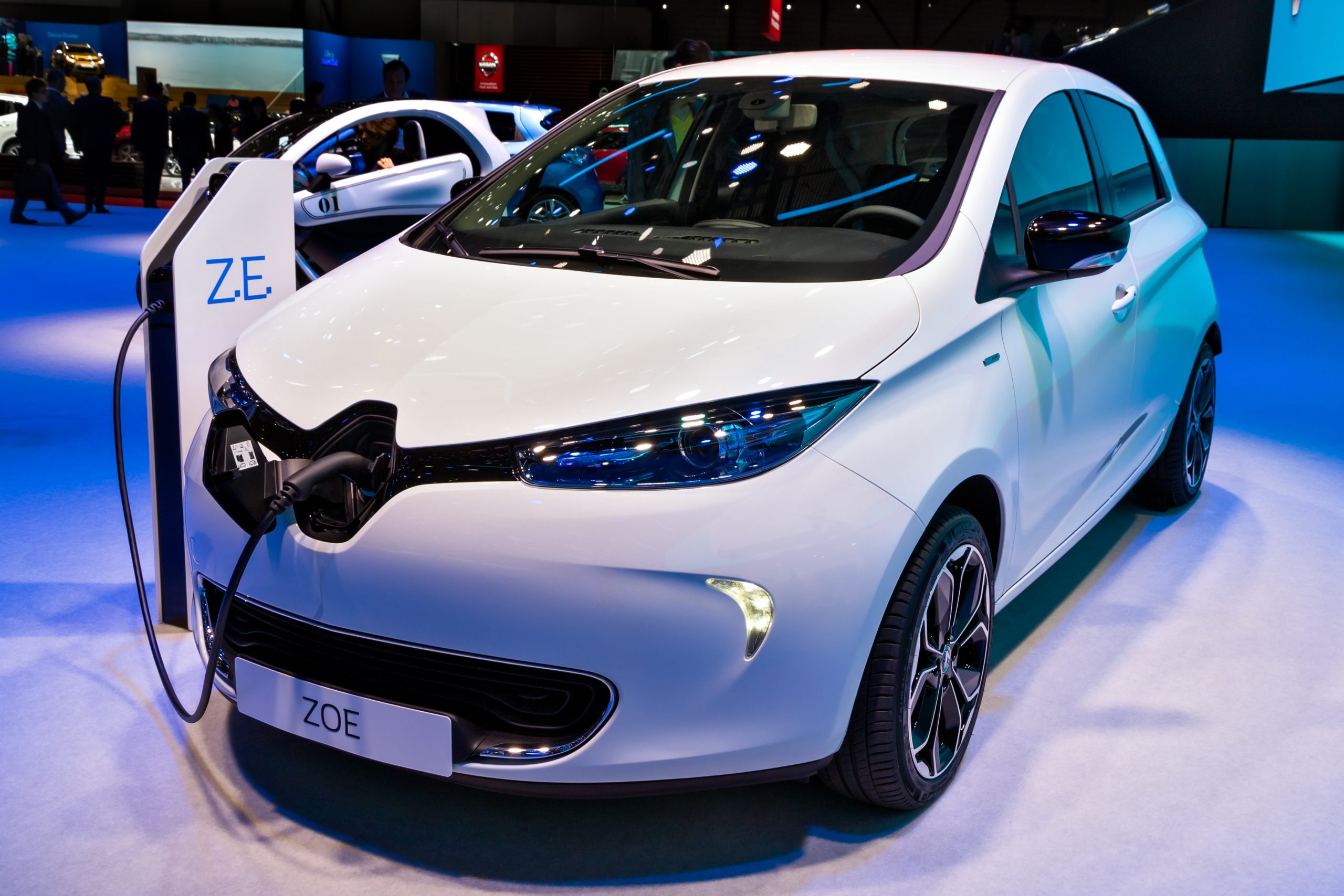 New white Renault Zoe electric car in a blue lit show room