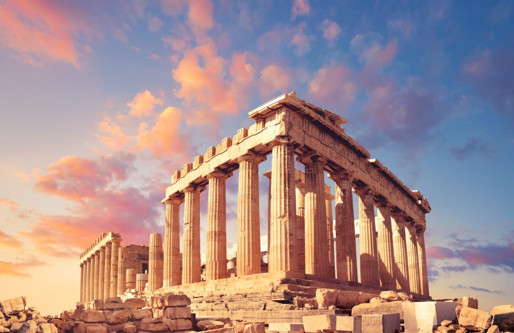 Parthenon, Athens at sunset. Pink and yellow cloud on a blue sky