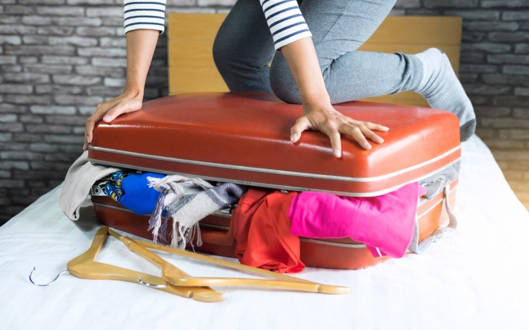 Woman Struggling to Pack