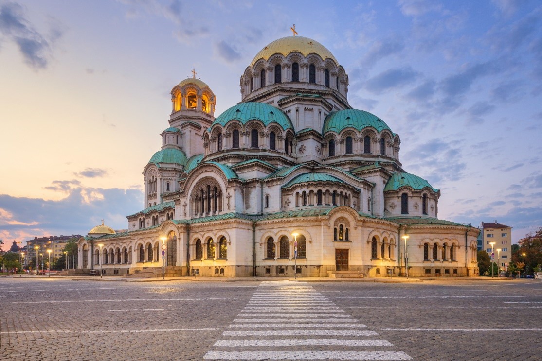 Low Shot from the road of a Zebra crossing leading to the St Alexander Nevsky Cathedral, Sofia, Bulgaria 