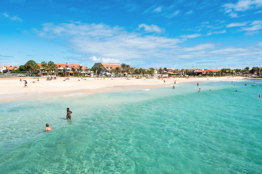 Turquoise water on a white sandy beach