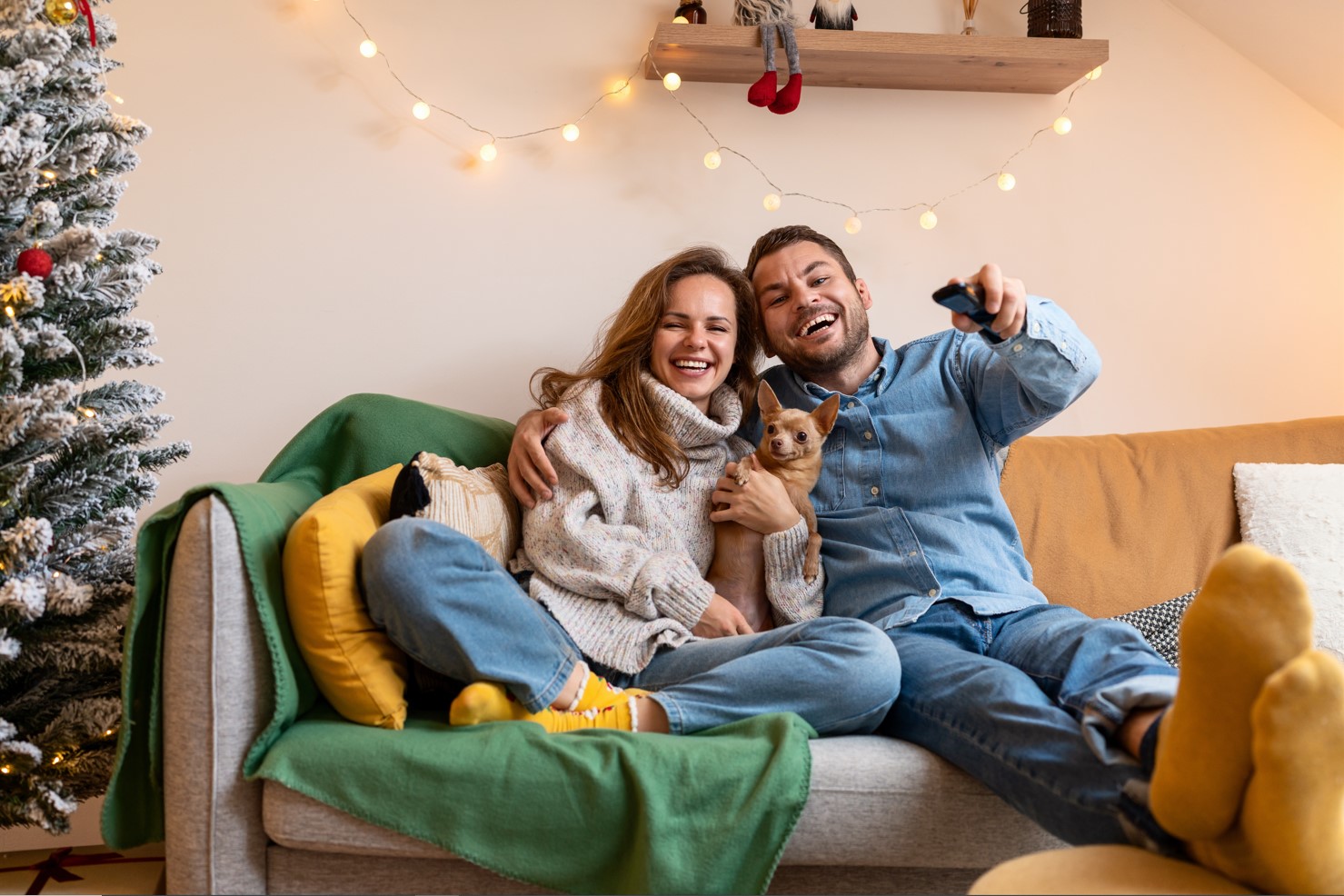 Couple on the sofa with dog