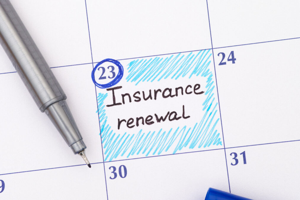 Close up of a calendar with a date circled and marked as Insurance renewal.