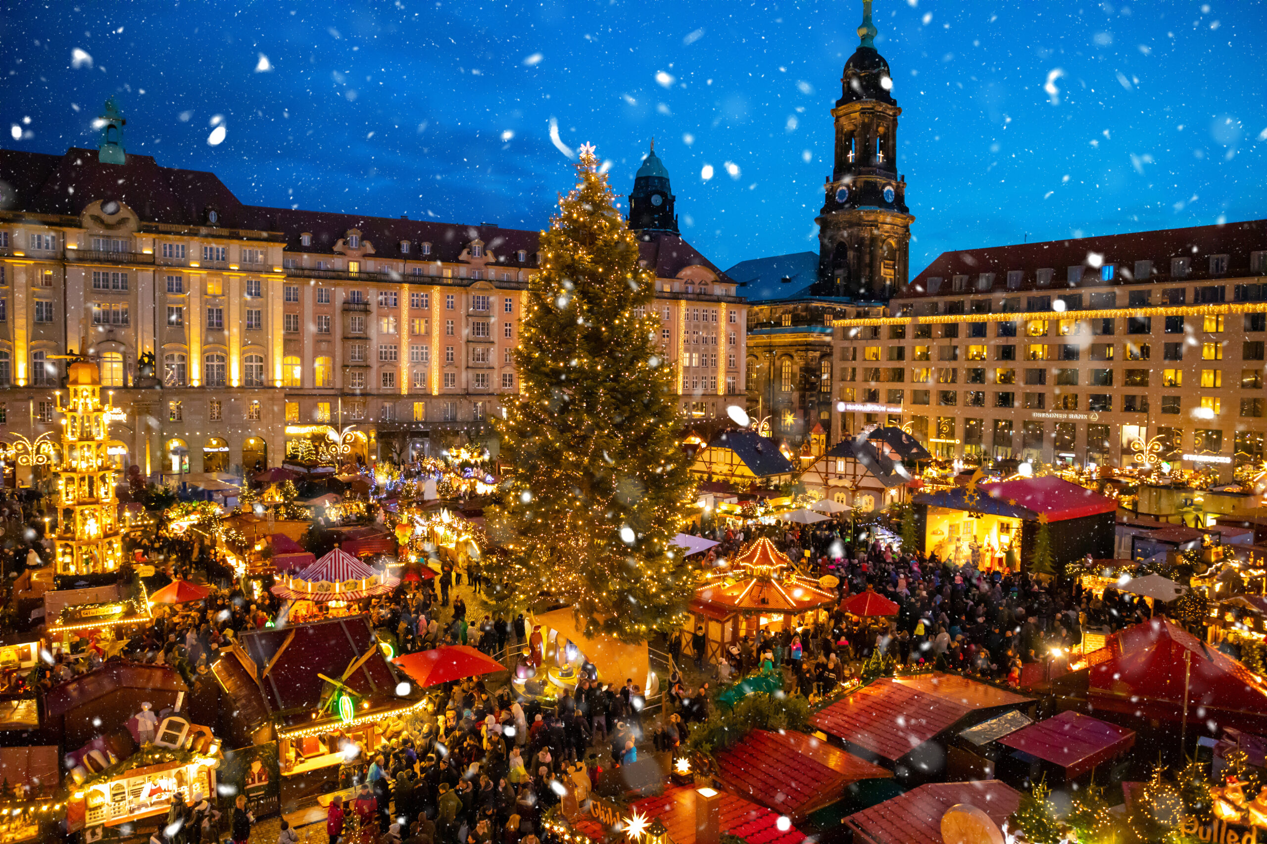 People visit Christmas Market Striezelmarkt in Dresden in Germany